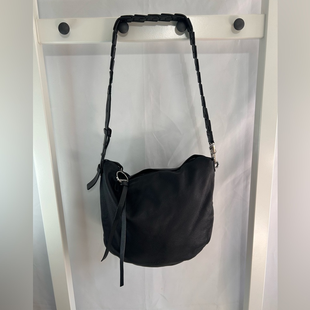 Liebeskind Berlin black leather hobo.  Zip closure.  Very roomy.  Woven handle.